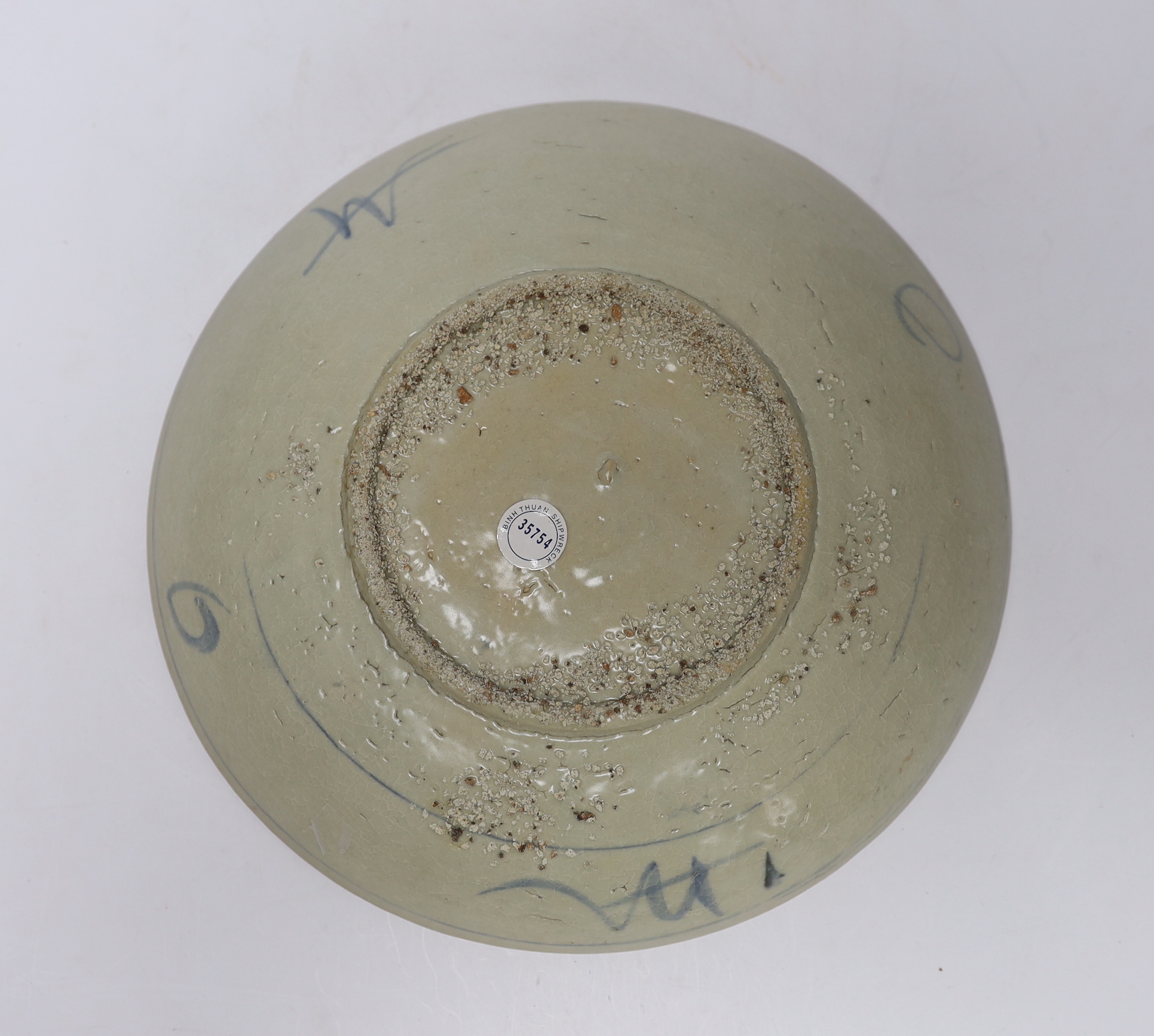 A Chinese Swatow blue and white phoenix dish, Binh Thuan shipwreck, early 17th century, 27.5cm